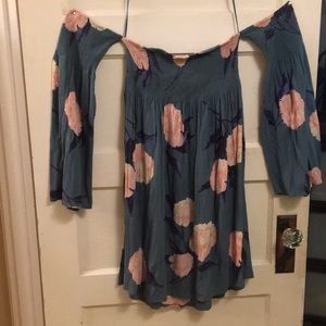 An off the shoulder floral dress
